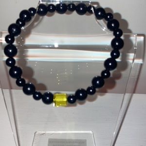 New black with yellow bead bracelet